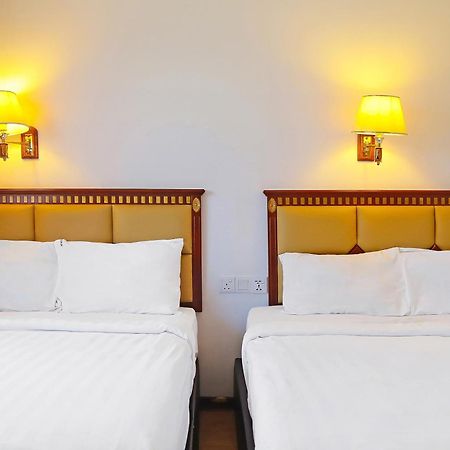 Super Oyo 90464 Borneo Suites Hotel Kota Kinabalu Esterno foto