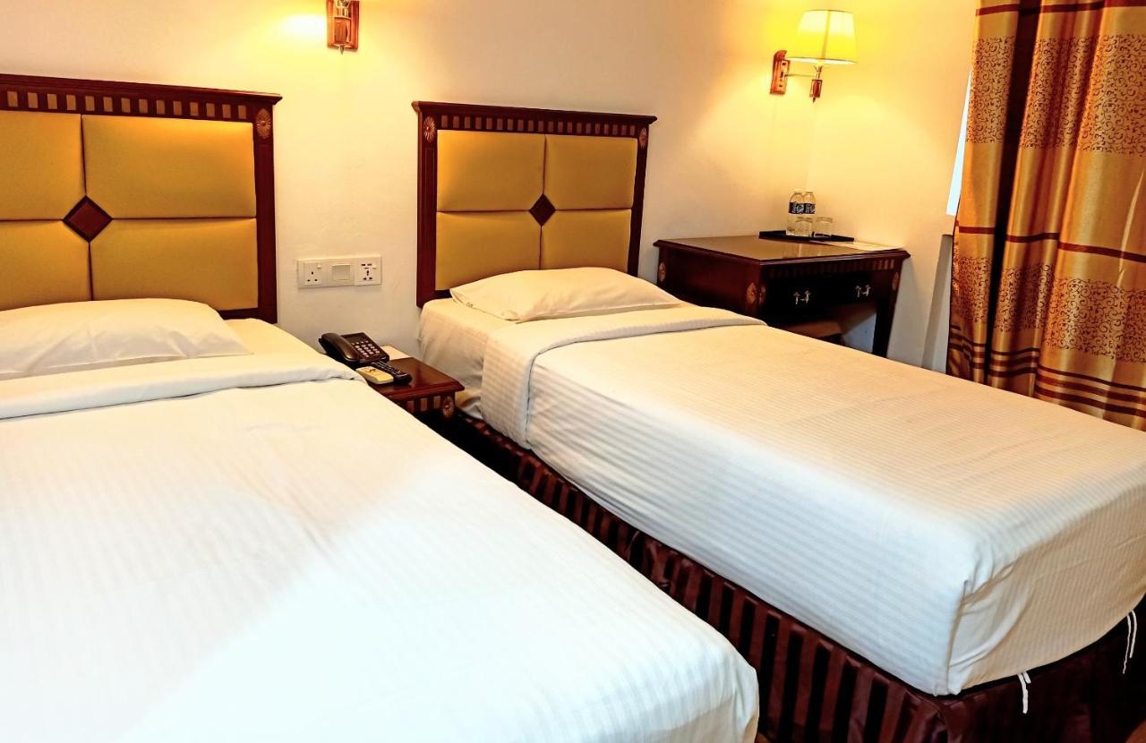 Super Oyo 90464 Borneo Suites Hotel Kota Kinabalu Esterno foto