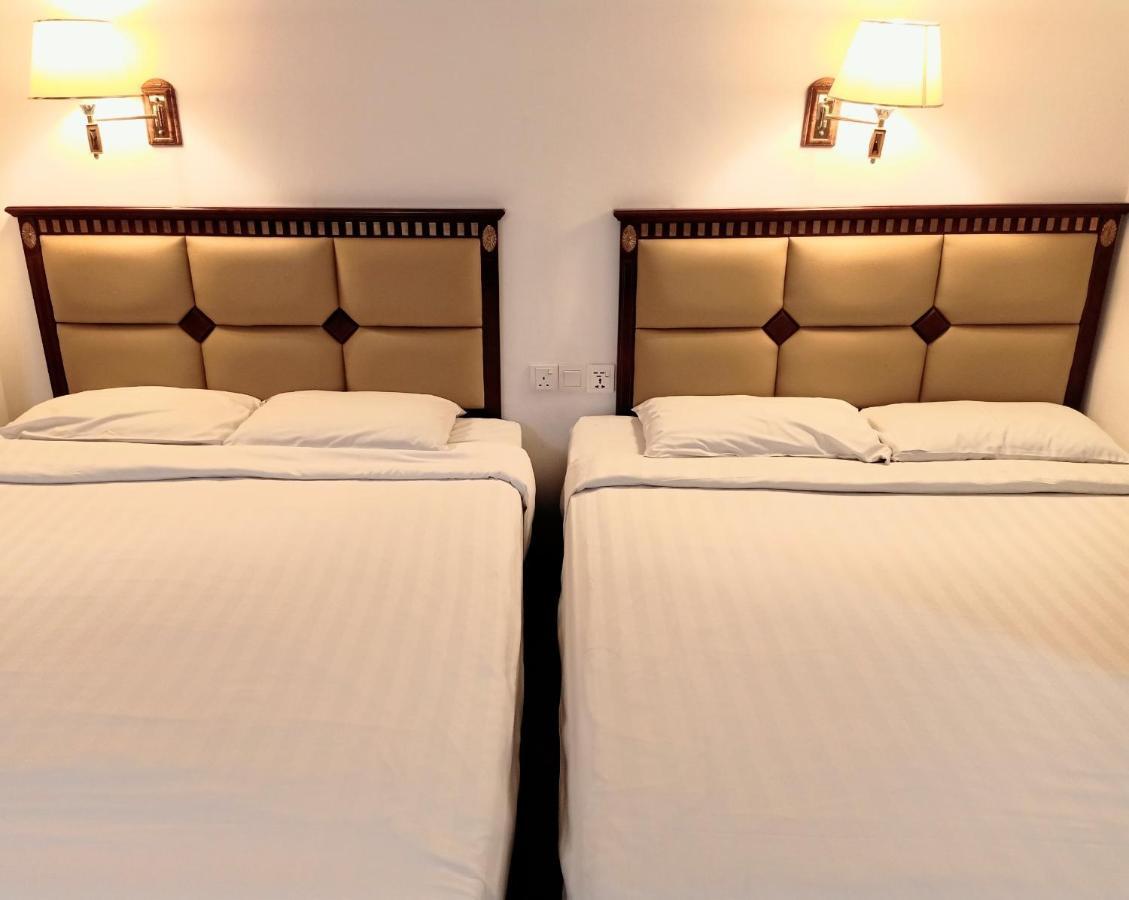 Super Oyo 90464 Borneo Suites Hotel Kota Kinabalu Esterno foto