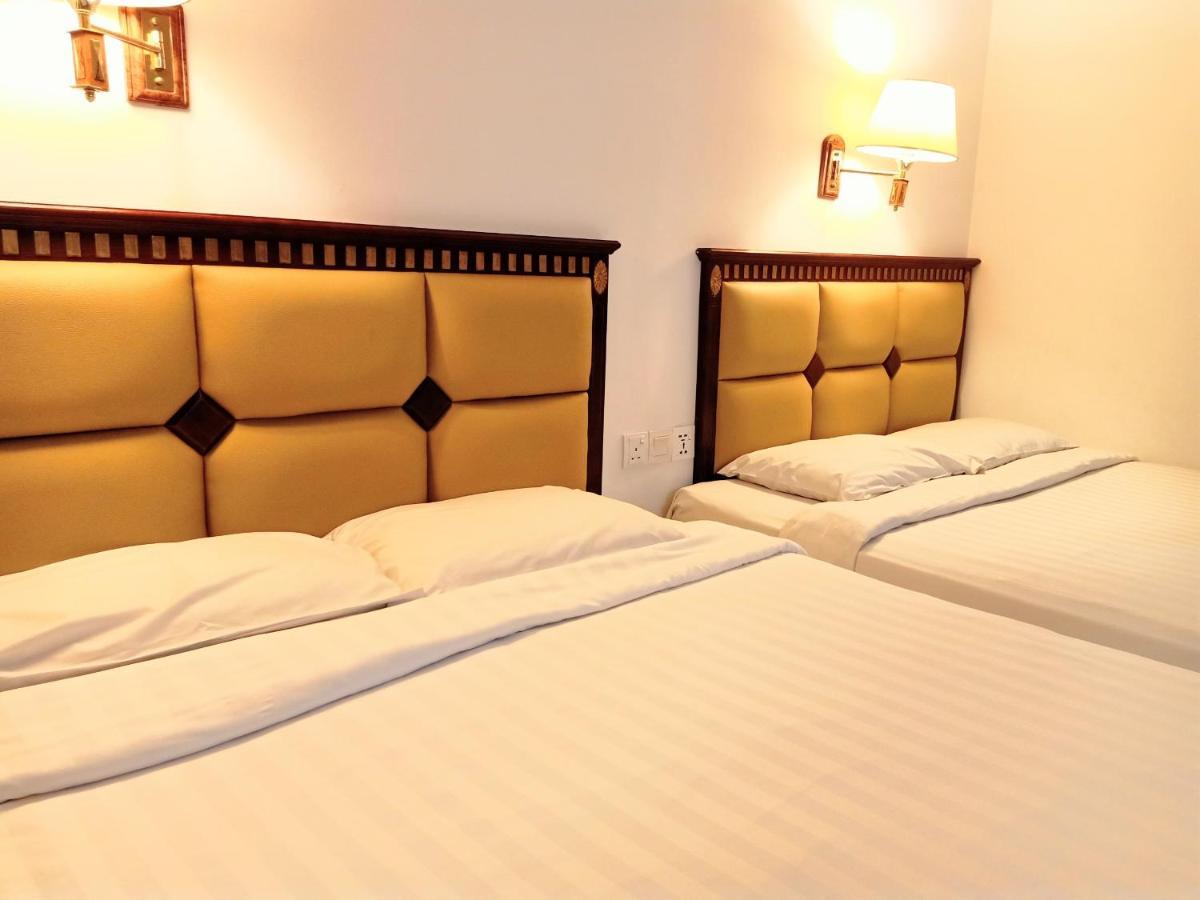 Super Oyo 90464 Borneo Suites Hotel Kota Kinabalu Esterno foto